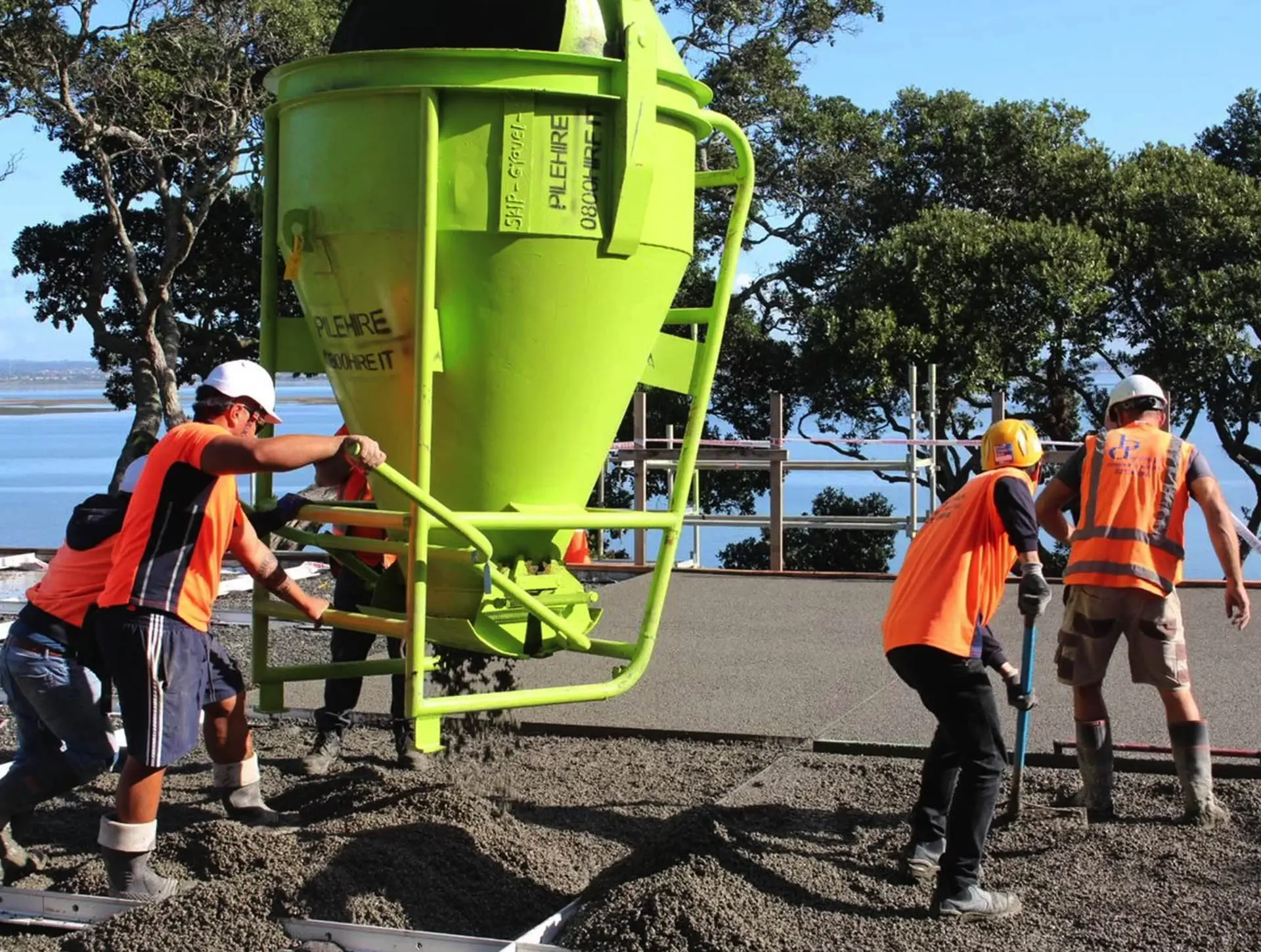 APC team working on concrete pavement at factory